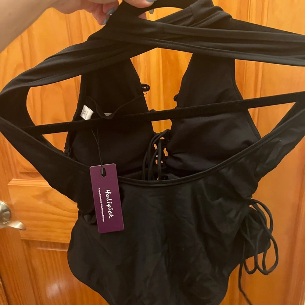 Brand new  Holipick black lace-up one-piece swimsuit.
Size xl - Picture 3 of 3